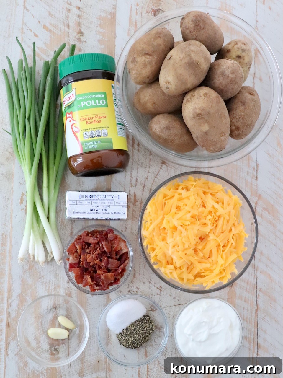 Loaded Mashed Potatoes Recipe with Bacon and Cheddar 3 ingredients for loaded mashed potatoes on white wood board