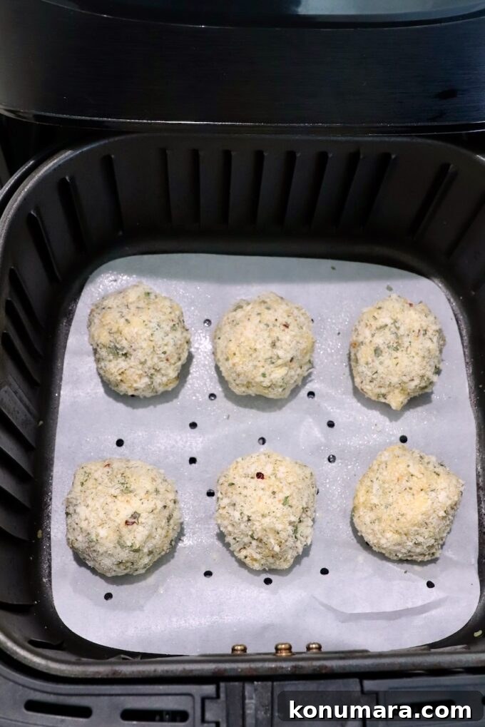 breaded mac and cheese bites in air fryer basket