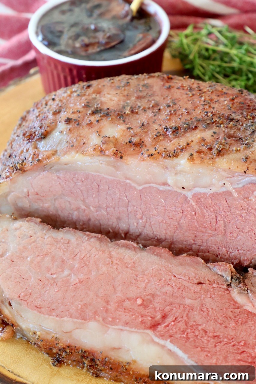 Smoked New York Strip Roast Recipe and Smoking Tips 12 smoked strip roast, sliced on wood serving tray