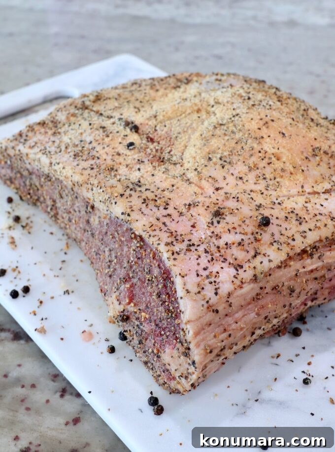 Smoked New York Strip Roast Recipe and Smoking Tips 4 seasoned strip roast on cutting board