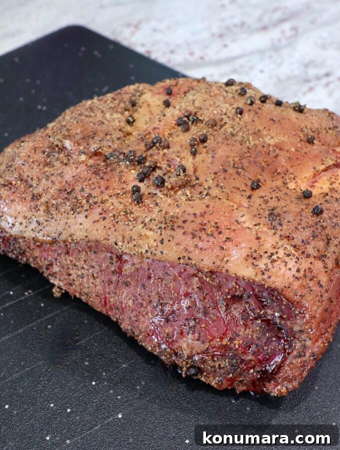 Smoked New York Strip Roast Recipe and Smoking Tips 6 smoked new york strip roast on cutting board