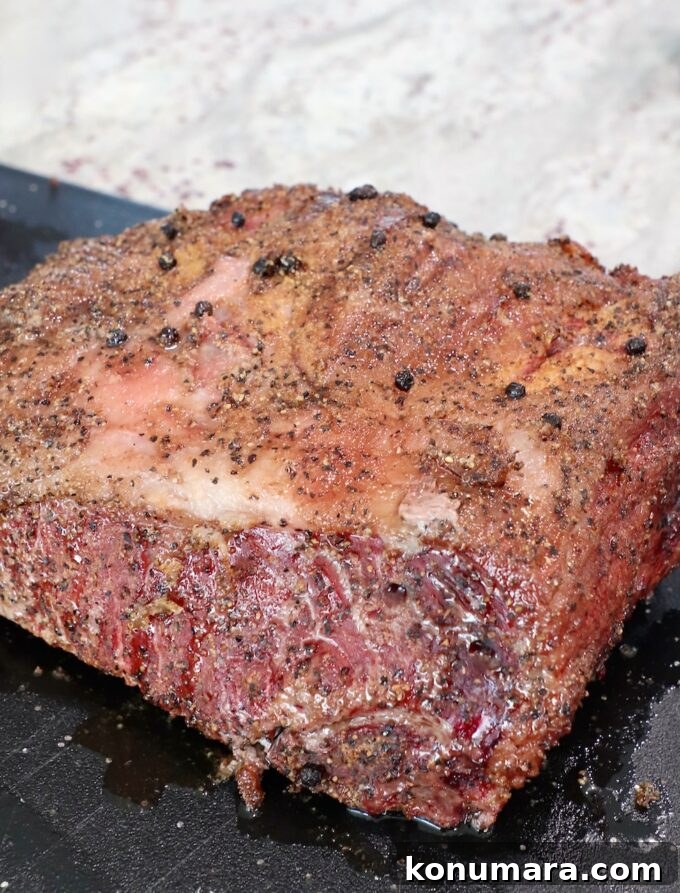 Smoked New York Strip Roast Recipe and Smoking Tips 8 smoked and seared strip roast on cutting board