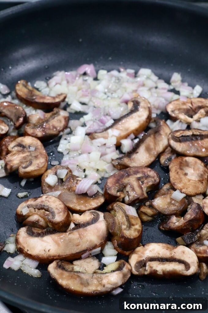 Smoked New York Strip Roast Recipe and Smoking Tips 9 sliced mushrooms and diced shallots in a skillet