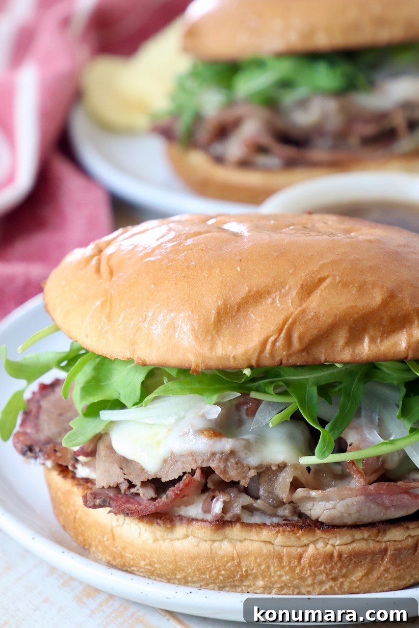 Classic Roast Beef Sandwich Recipe with Horseradish 2 prepared roast beef sandwich on plate