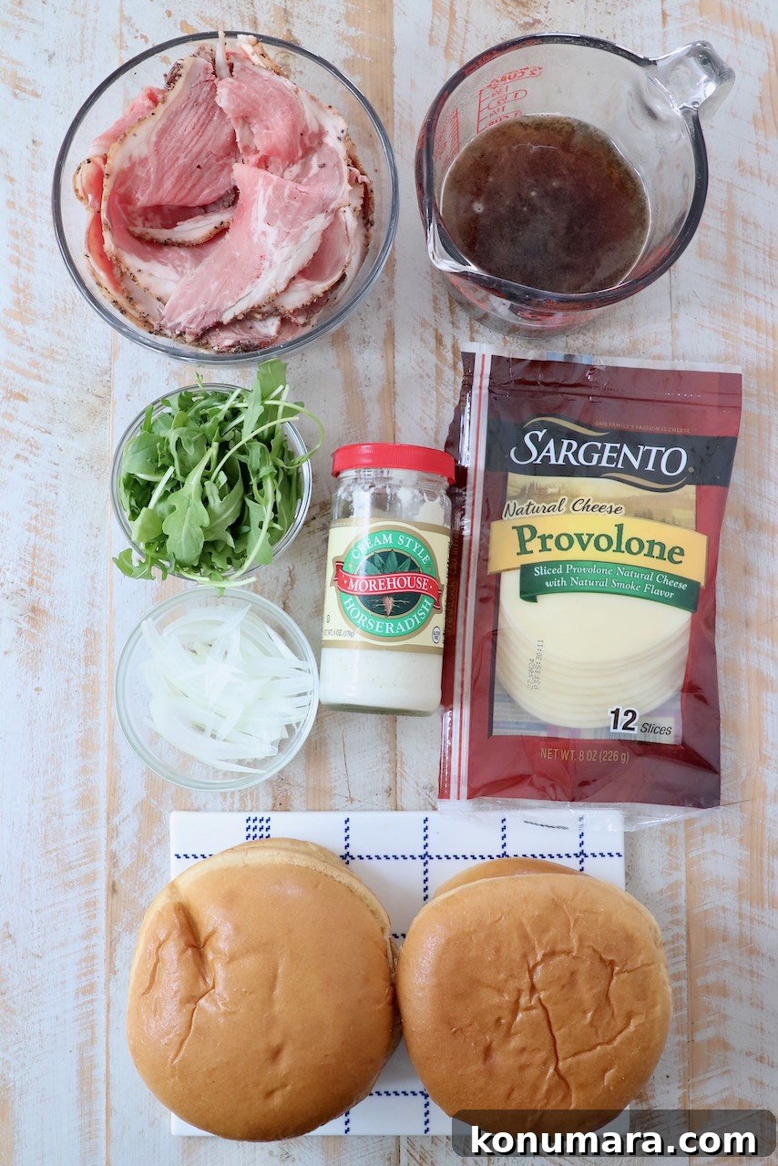 Classic Roast Beef Sandwich Recipe with Horseradish 3 ingredients for roast beef sandwiches on white wood board