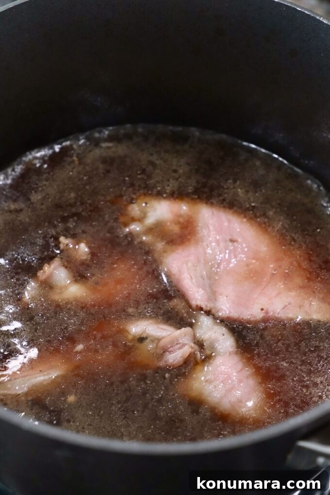 Classic Roast Beef Sandwich Recipe with Horseradish 5 slices of beef in beef broth in sauce pot