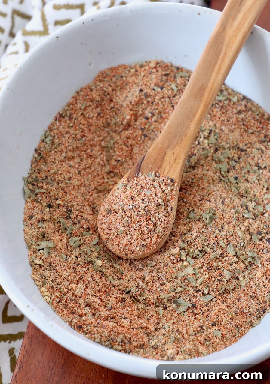 meatloaf seasoning in bowl with wood spoon