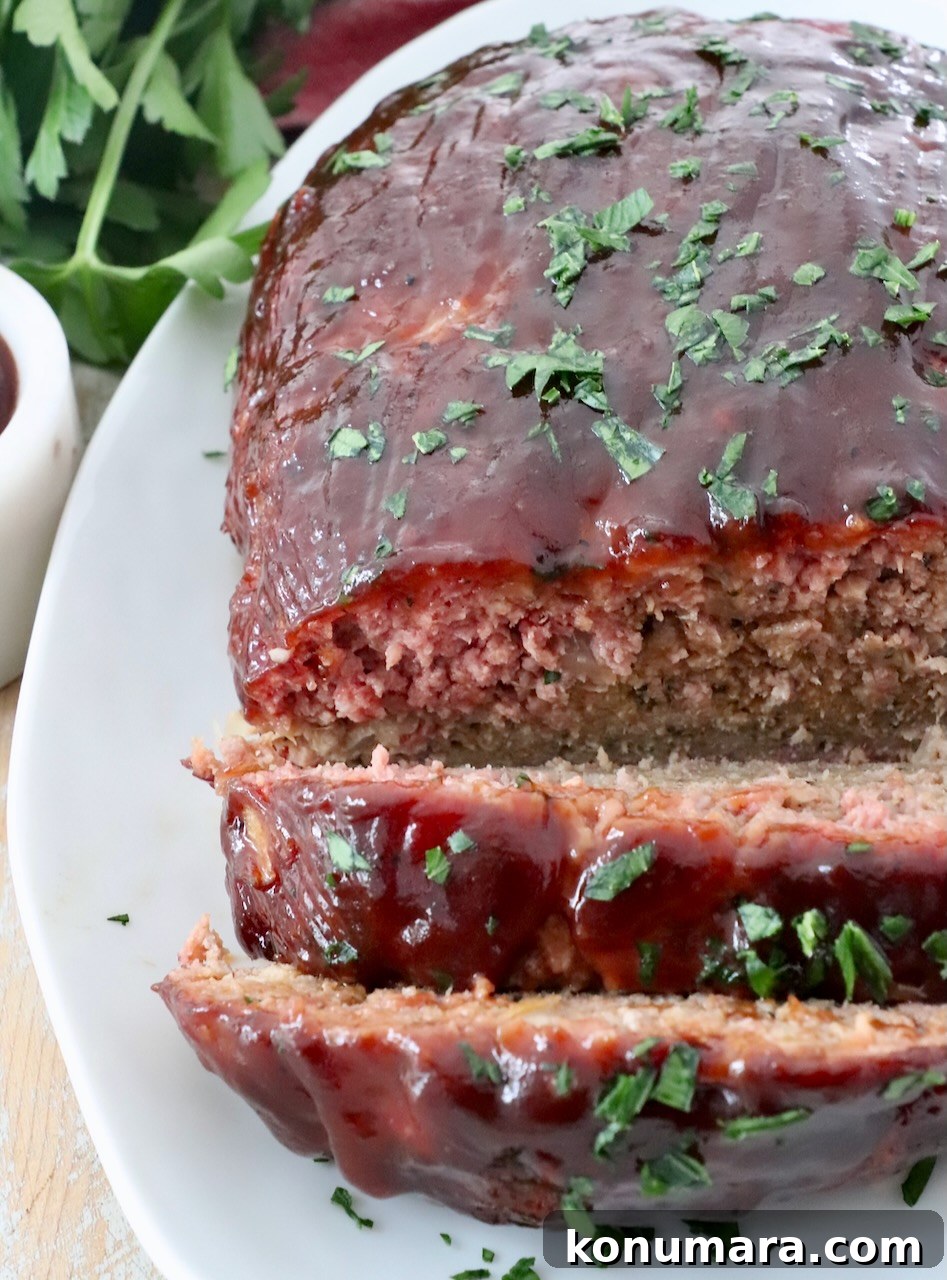 How to Smoke Meatloaf for Tender, Flavorful Results 9 sliced, smoked meatloaf on plate