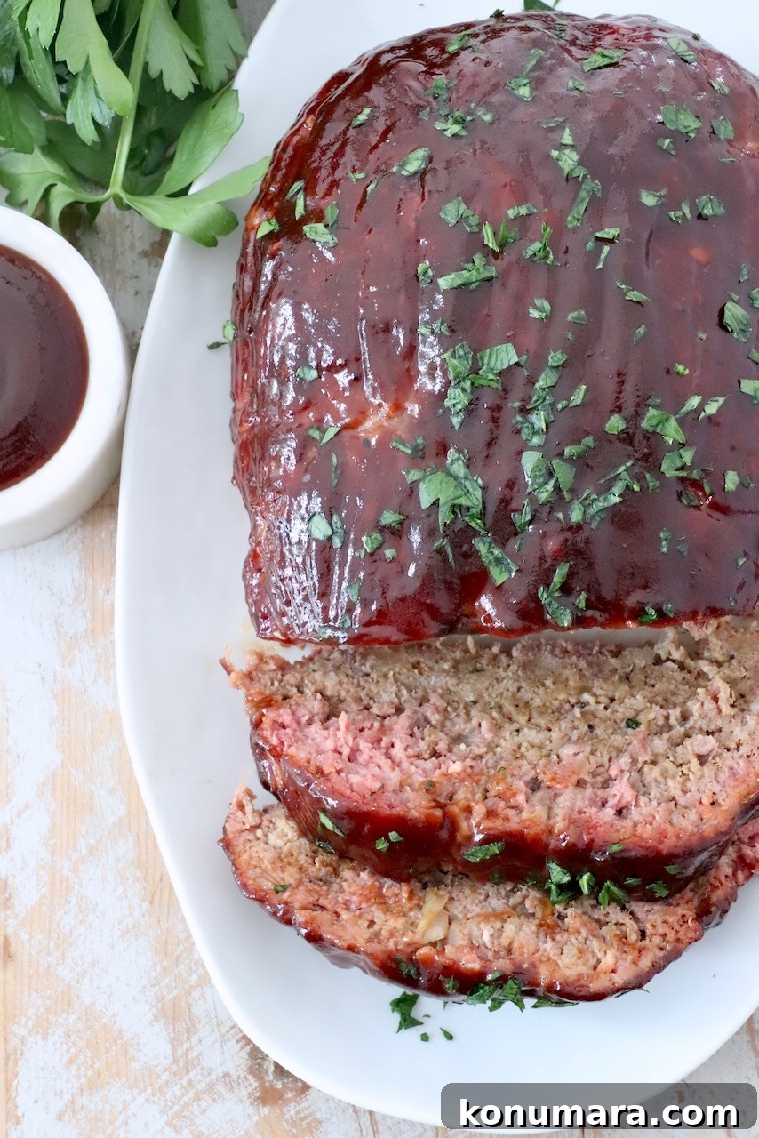How to Smoke Meatloaf for Tender, Flavorful Results 10 smoked, sliced bbq meatloaf on plate