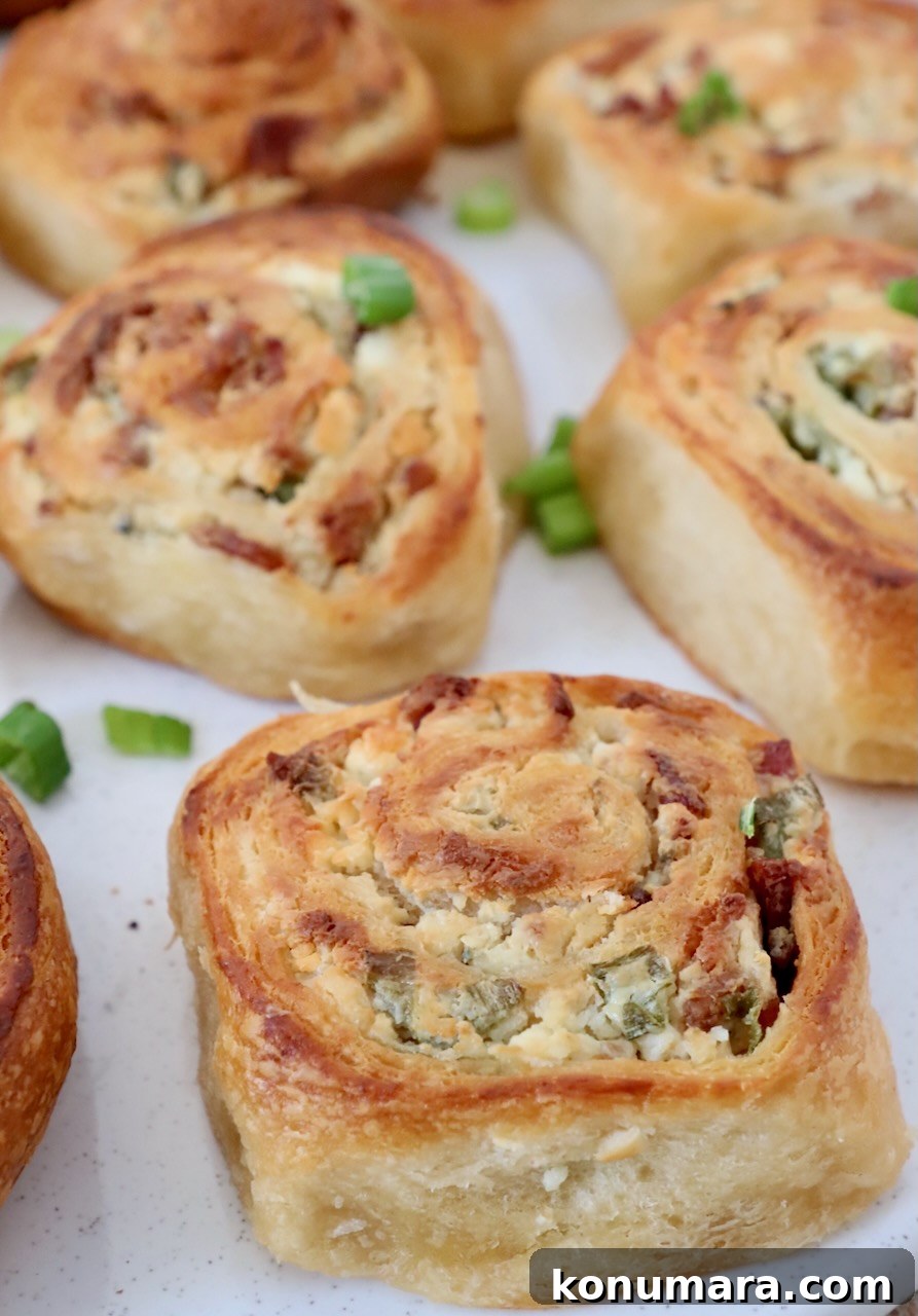 cooked cheesy bacon crescent rolls on serving tray