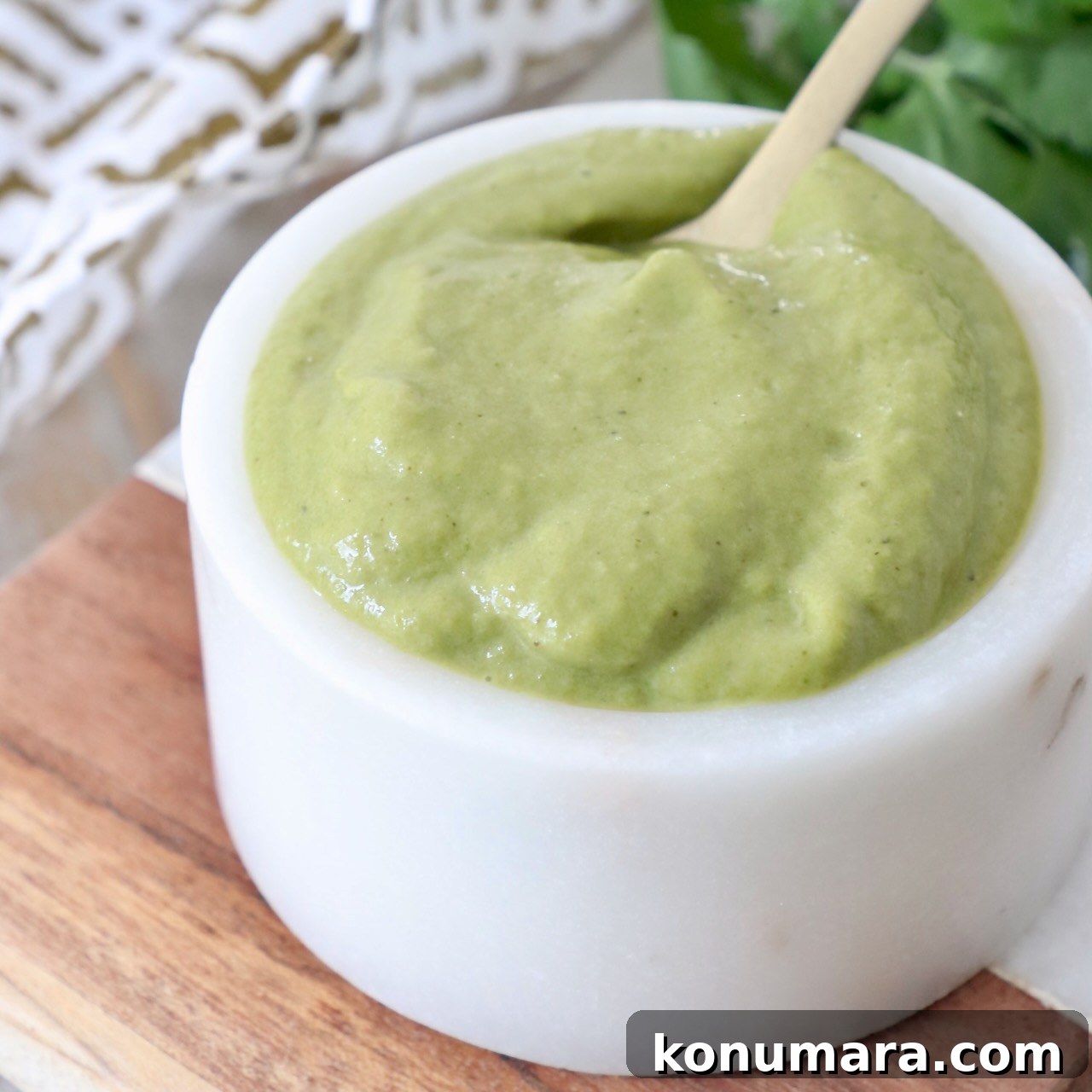 poblano sauce in small bowl with spoon