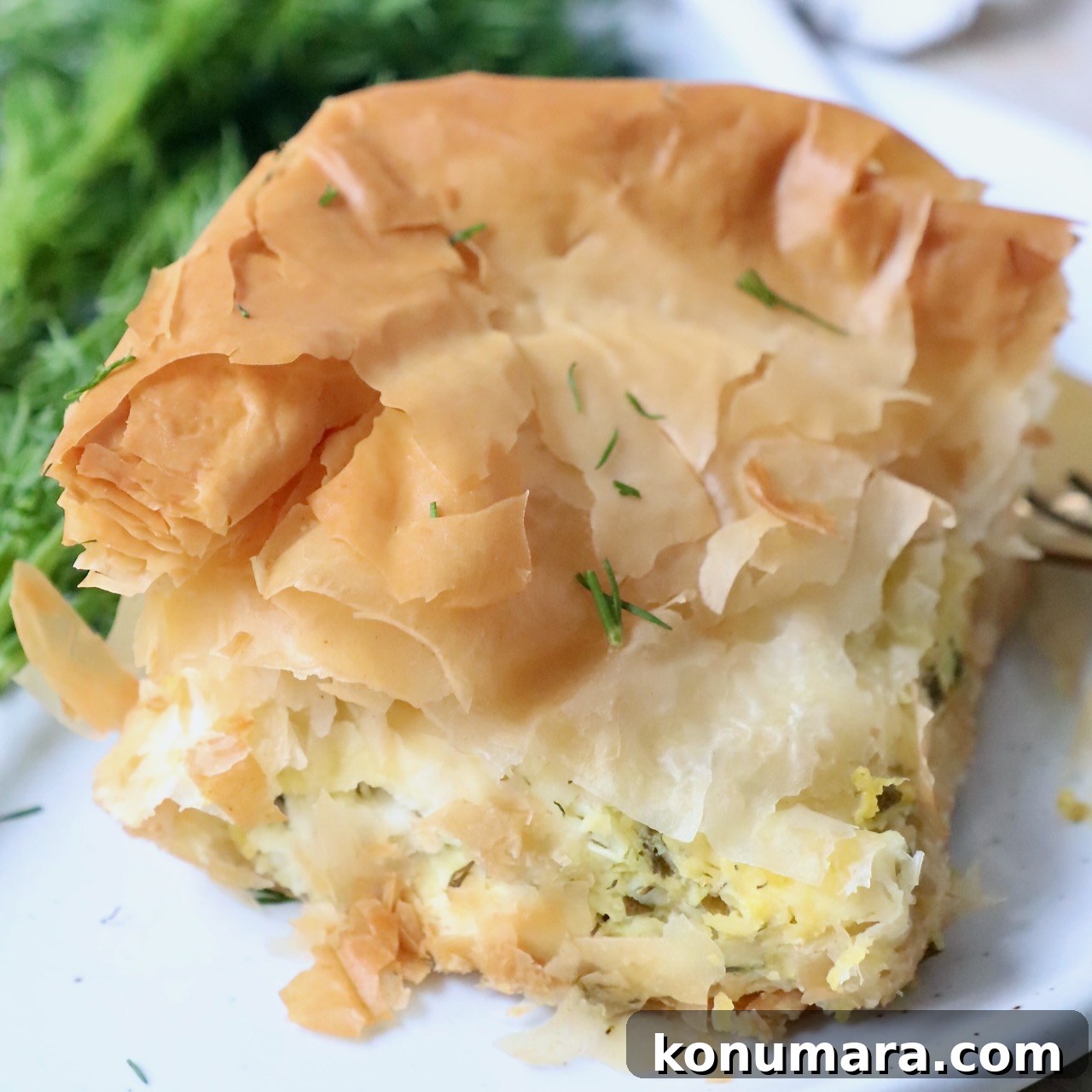 piece of Greek zucchini pie on plate