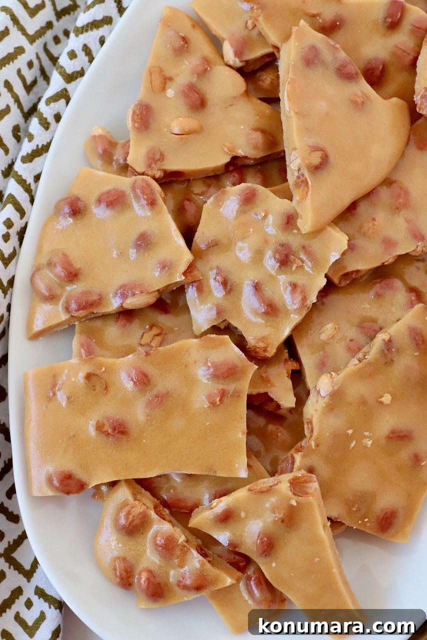 cracked peanut brittle on plate