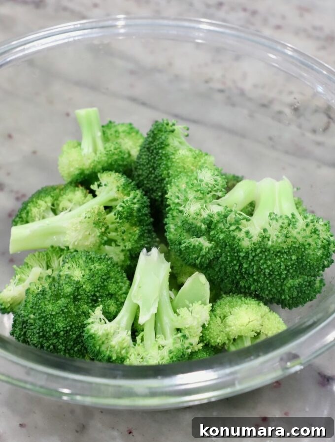 steamed broccoli in glass bowl