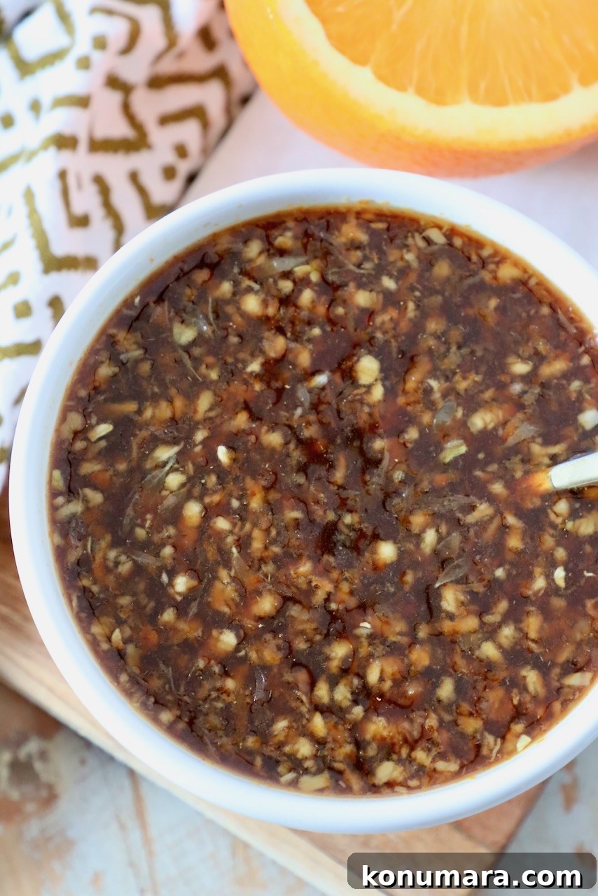 Tangy Orange Sauce Recipe for Chicken, Duck and Desserts 2 orange sauce in bowl with spoon