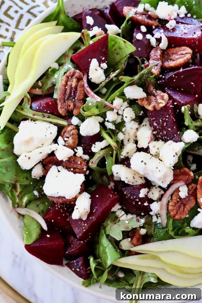 How to Cook Beets: Roast, Boil, and Sauté 19 salad in bowl topped with roasted beets and feta cheese crumbles