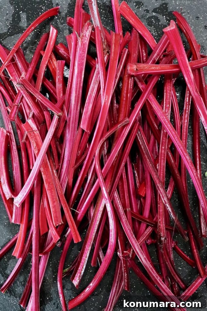 What to Do With Beet Greens: Recipes and Storage Tips 3 beet stems on cutting board