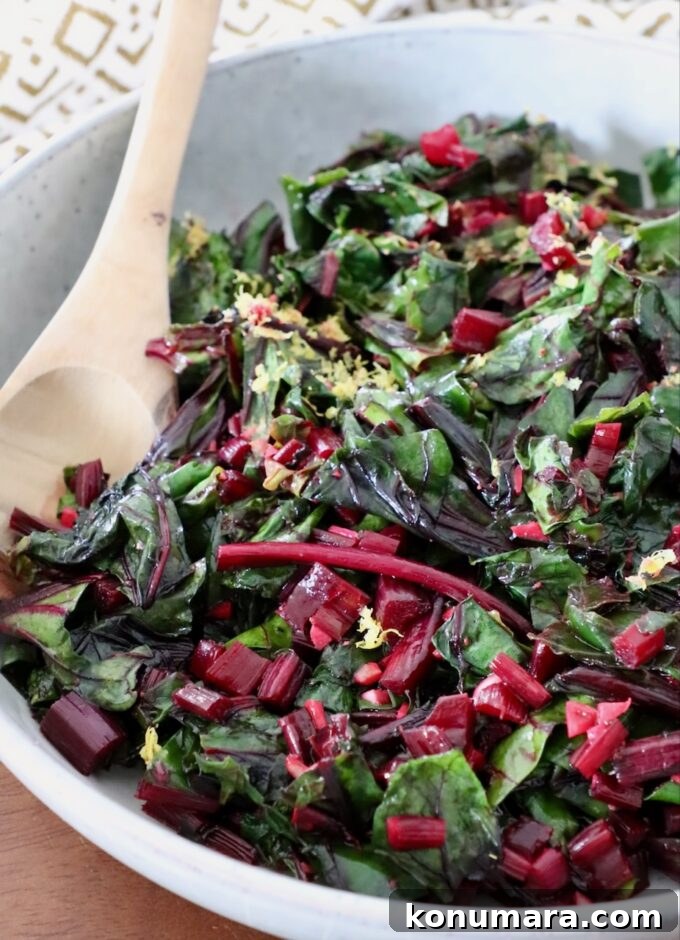 What to Do With Beet Greens: Recipes and Storage Tips 10 sauteed beet greens in a bowl with a wooden spoon