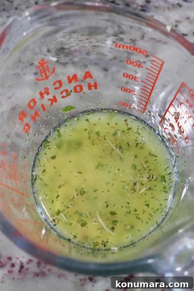 seasoned melted butter in a glass jar