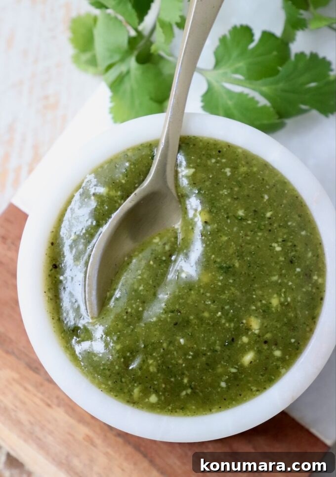 tamarind cashew sauce in bowl with spoon
