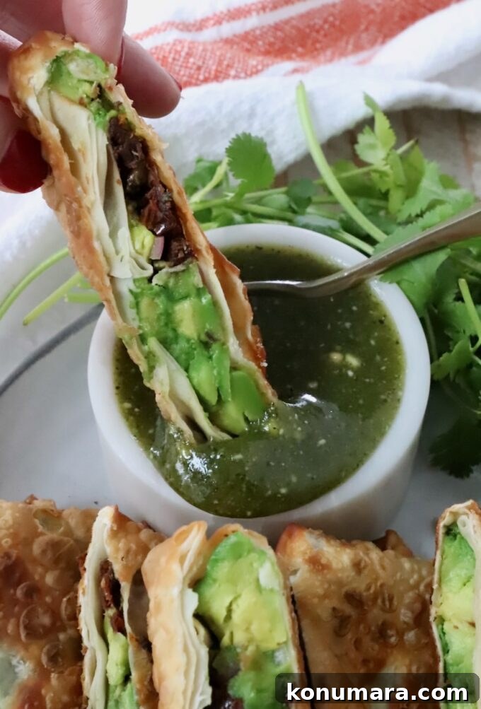avocado egg roll dipped in tamarind cashew sauce