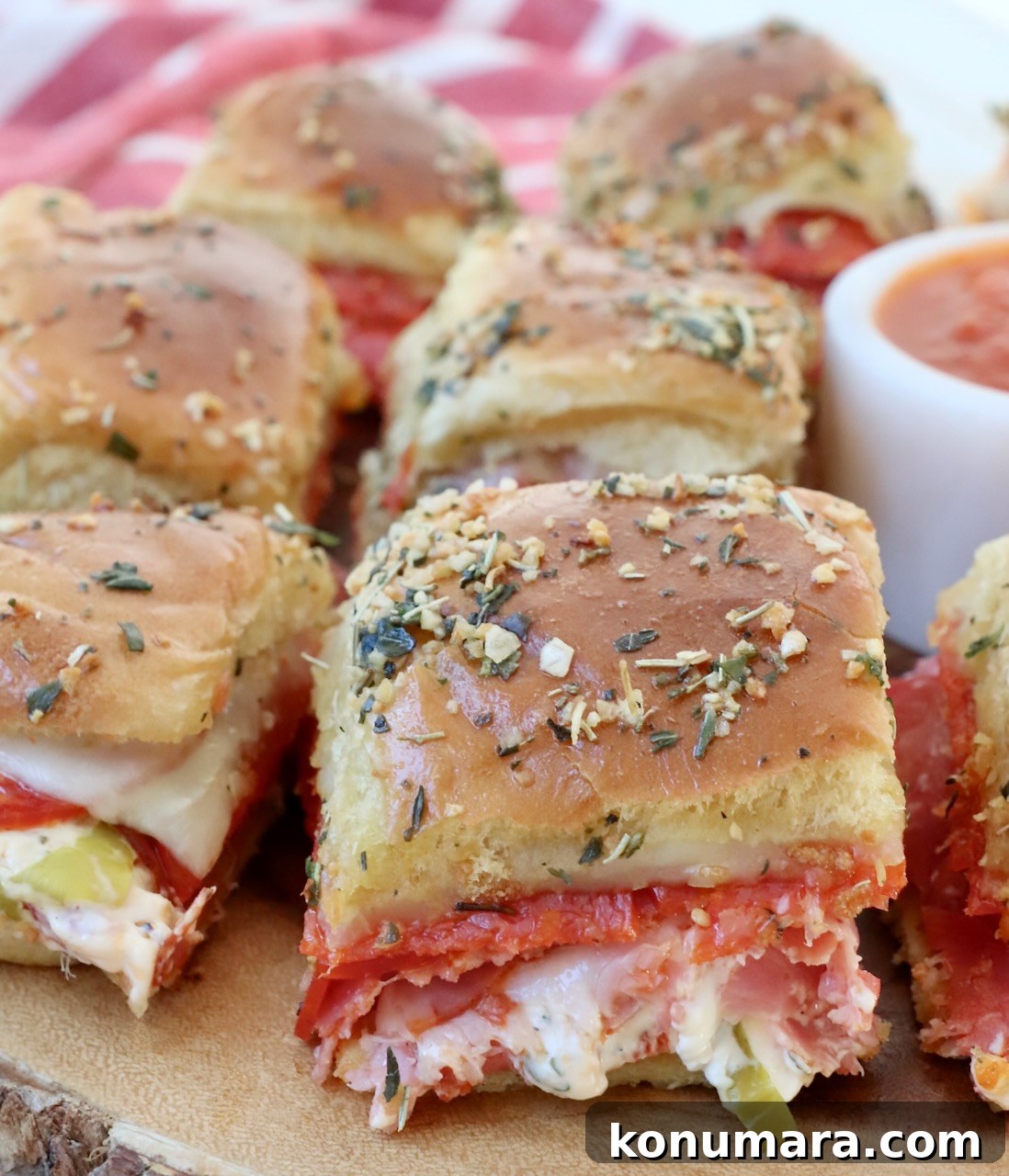 Italian sub sliders on wood serving tray