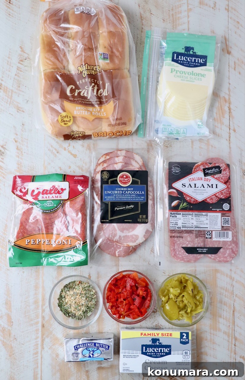 ingredients for Italian sub sliders on white wood board