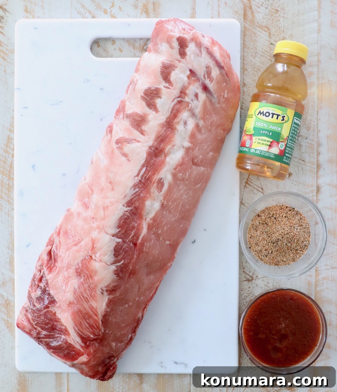 Tender Instant Pot Ribs in 45 Minutes 3 ingredients for instant pot ribs on white wood board