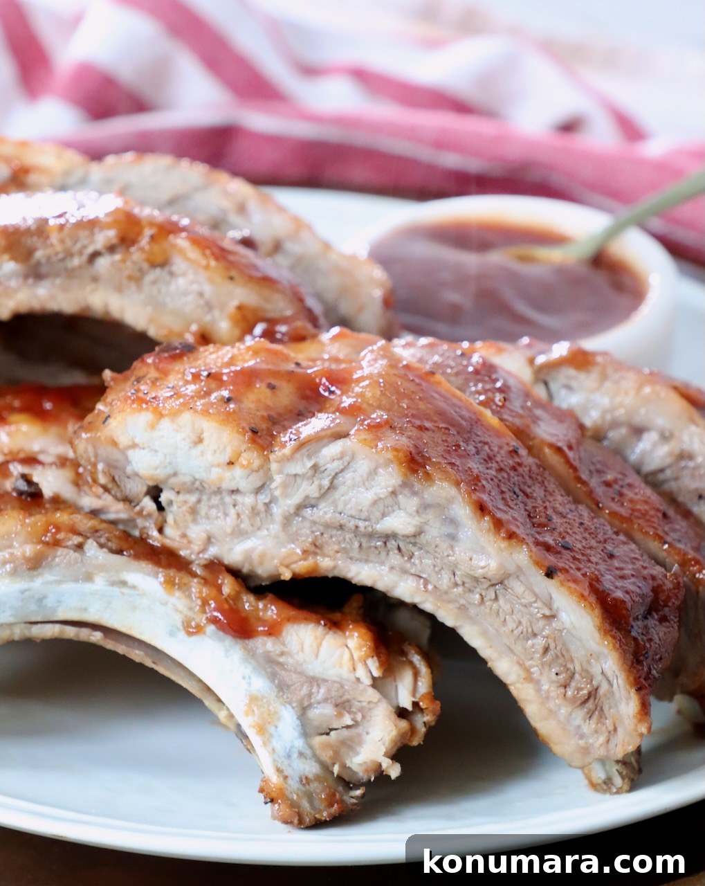Tender Instant Pot Ribs in 45 Minutes 8 cooked baby back ribs sliced apart on plate