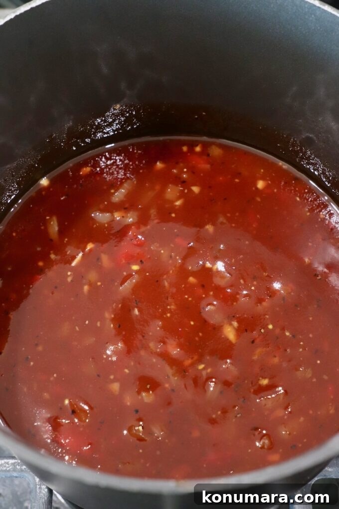 Jack Daniel's BBQ Sauce Recipe: Smoky and Tangy 5 bbq sauce in pan on the stove