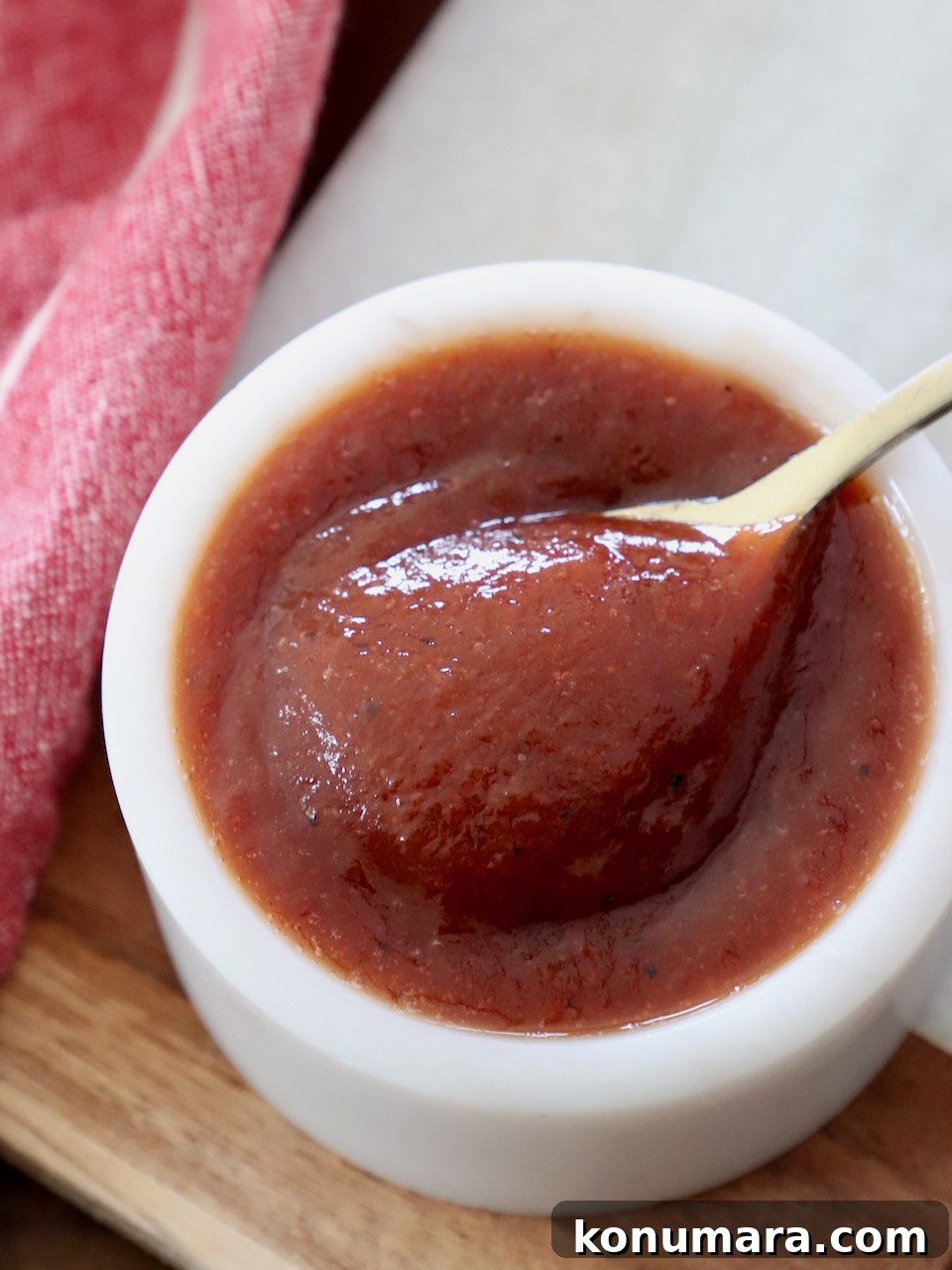 Jack Daniel's BBQ Sauce Recipe: Smoky and Tangy 7 bbq sauce in small bowl with spoon