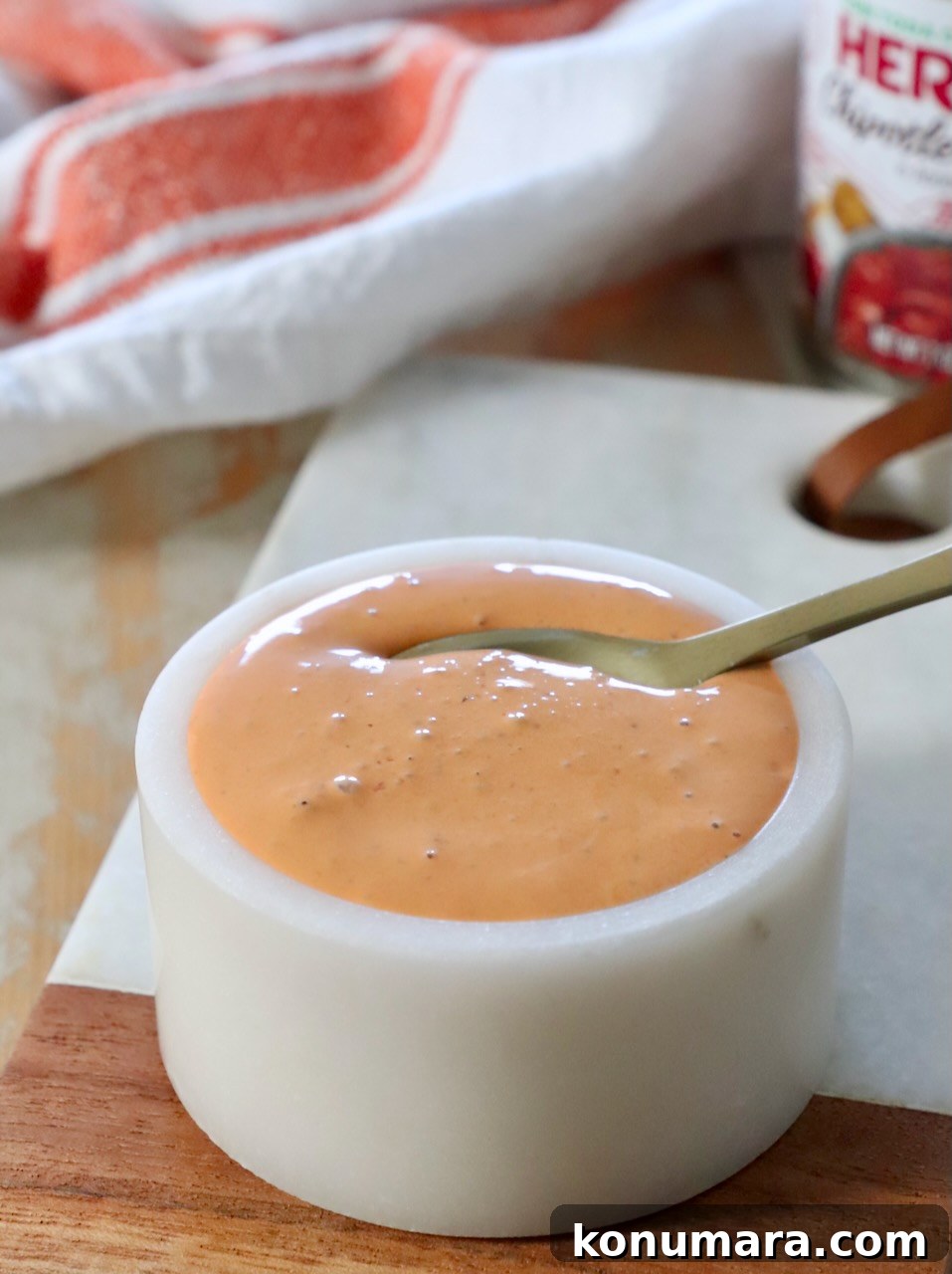 How to Make Smoky Chipotle Sauce for Tacos, Burgers and Dips 8 chipotle sauce in bowl with spoon