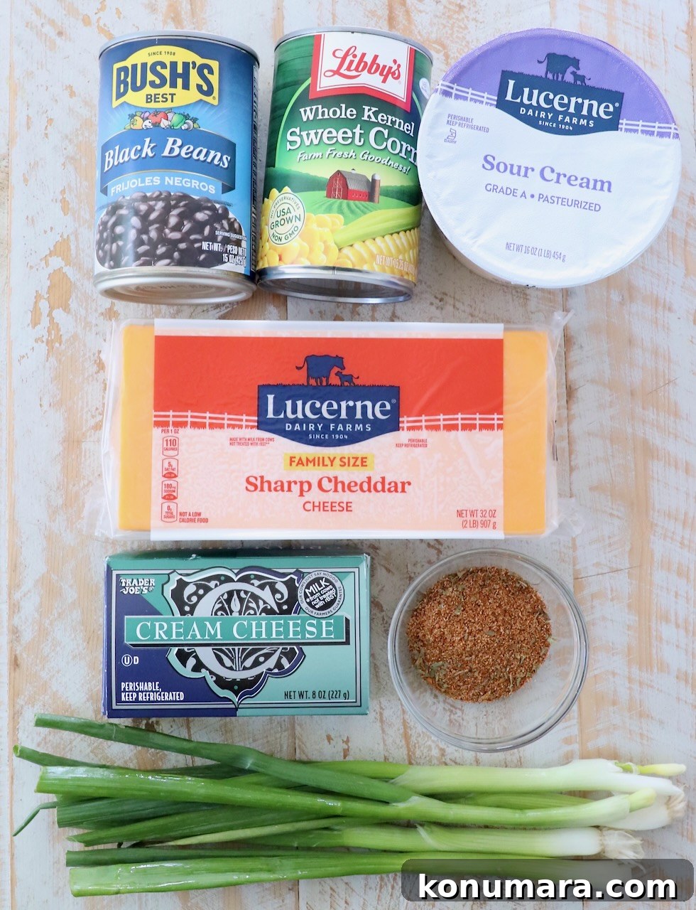 ingredients for southwest dip on white wood board