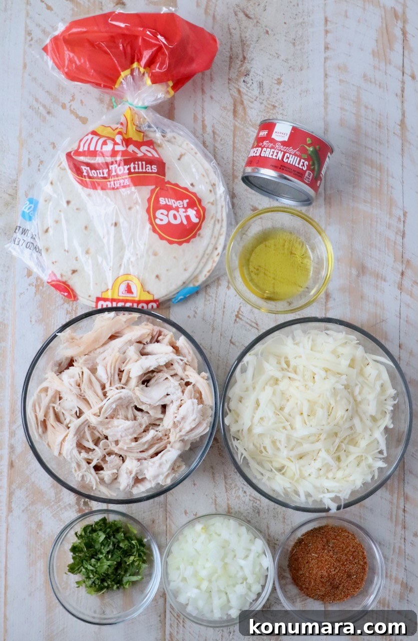 Crispy Air Fryer Taquitos Recipe 3 ingredients for air fryer taquitos on white wood board