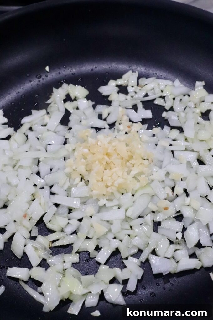 diced onions and minced garlic in a skillet