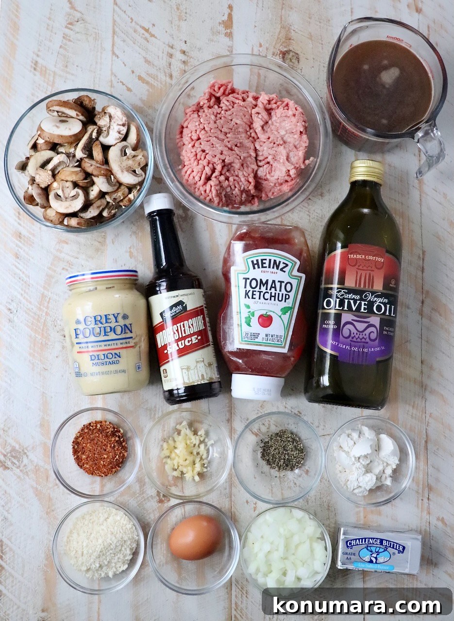 ingredients for salisbury steak on white wood board