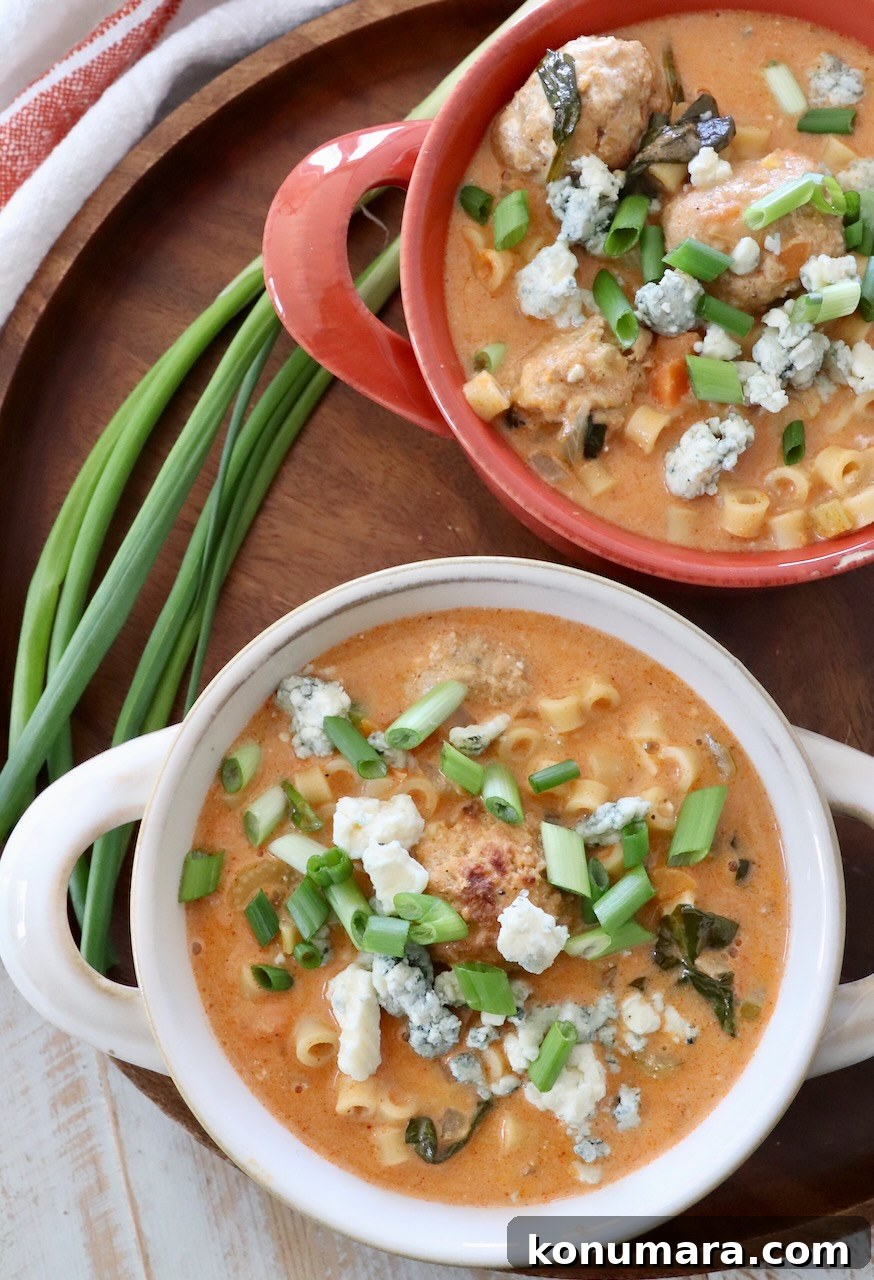 Creamy Buffalo Chicken Soup Recipe 10 buffalo chicken soup in bowls with green onions
