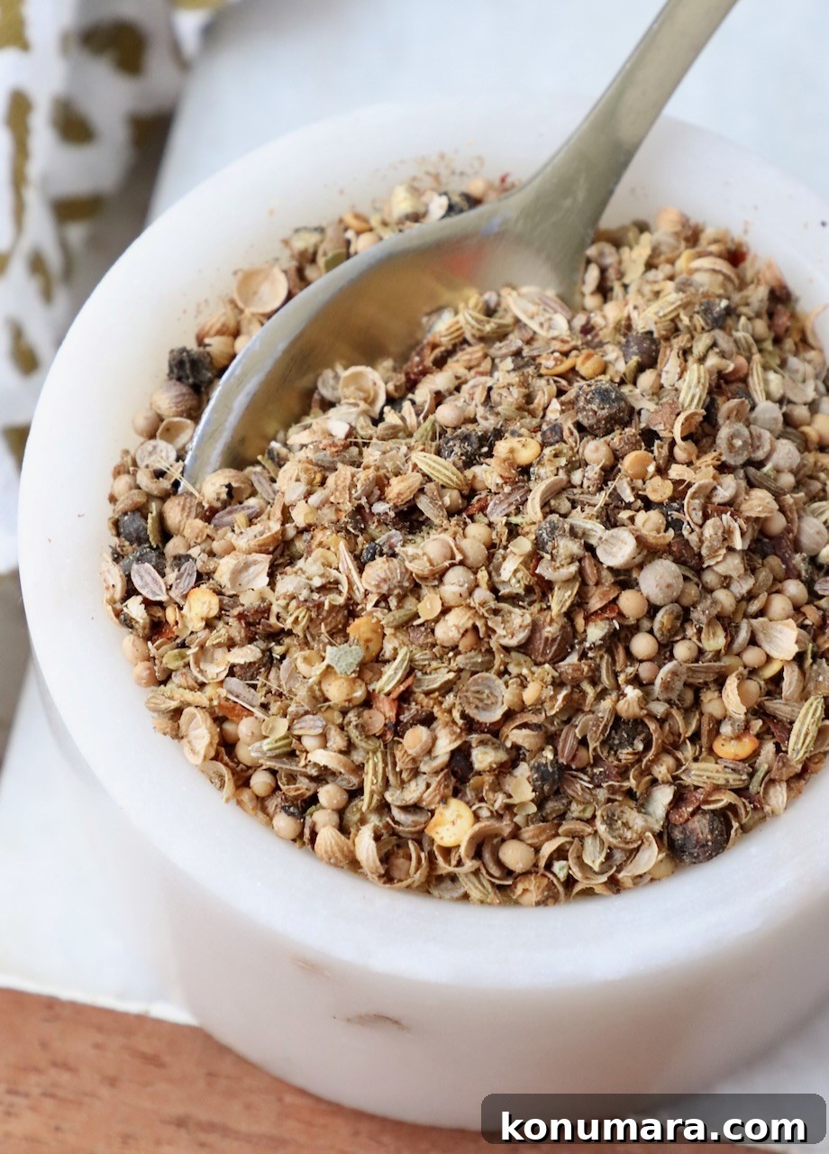 Corned Beef Seasoning Blend Recipe for Classic Flavor 2 corned beef seasoning in small bowl with spoon