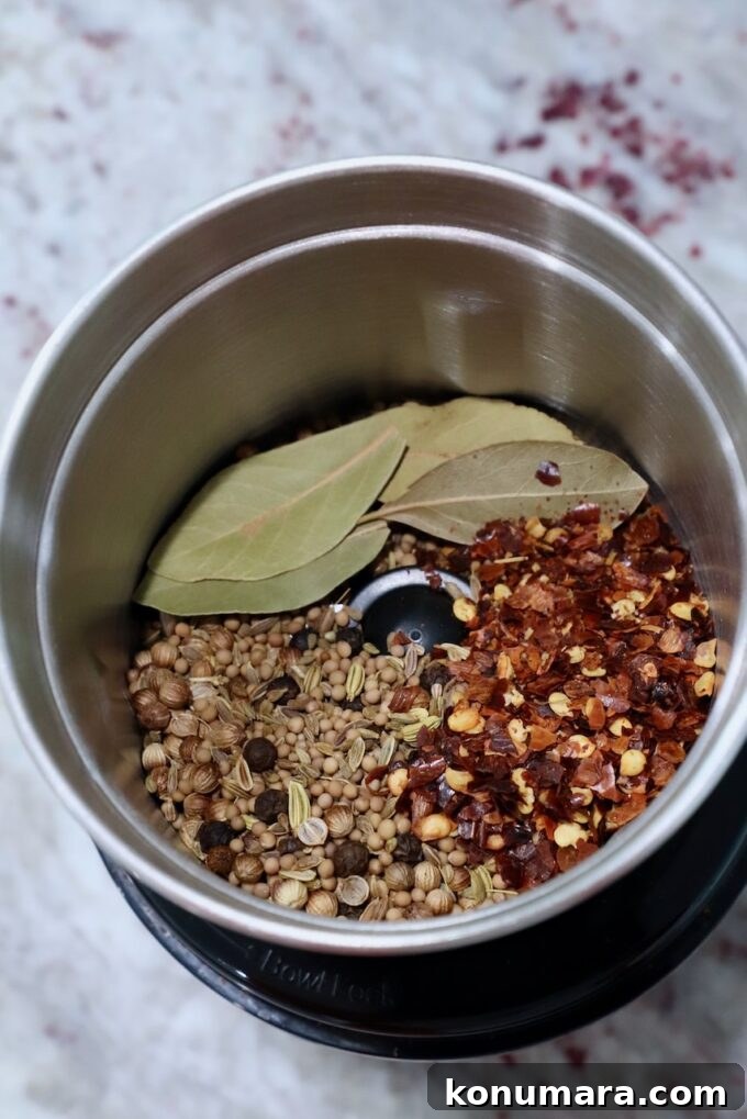 Corned Beef Seasoning Blend Recipe for Classic Flavor 5 spices and bay leaves in spice grinder
