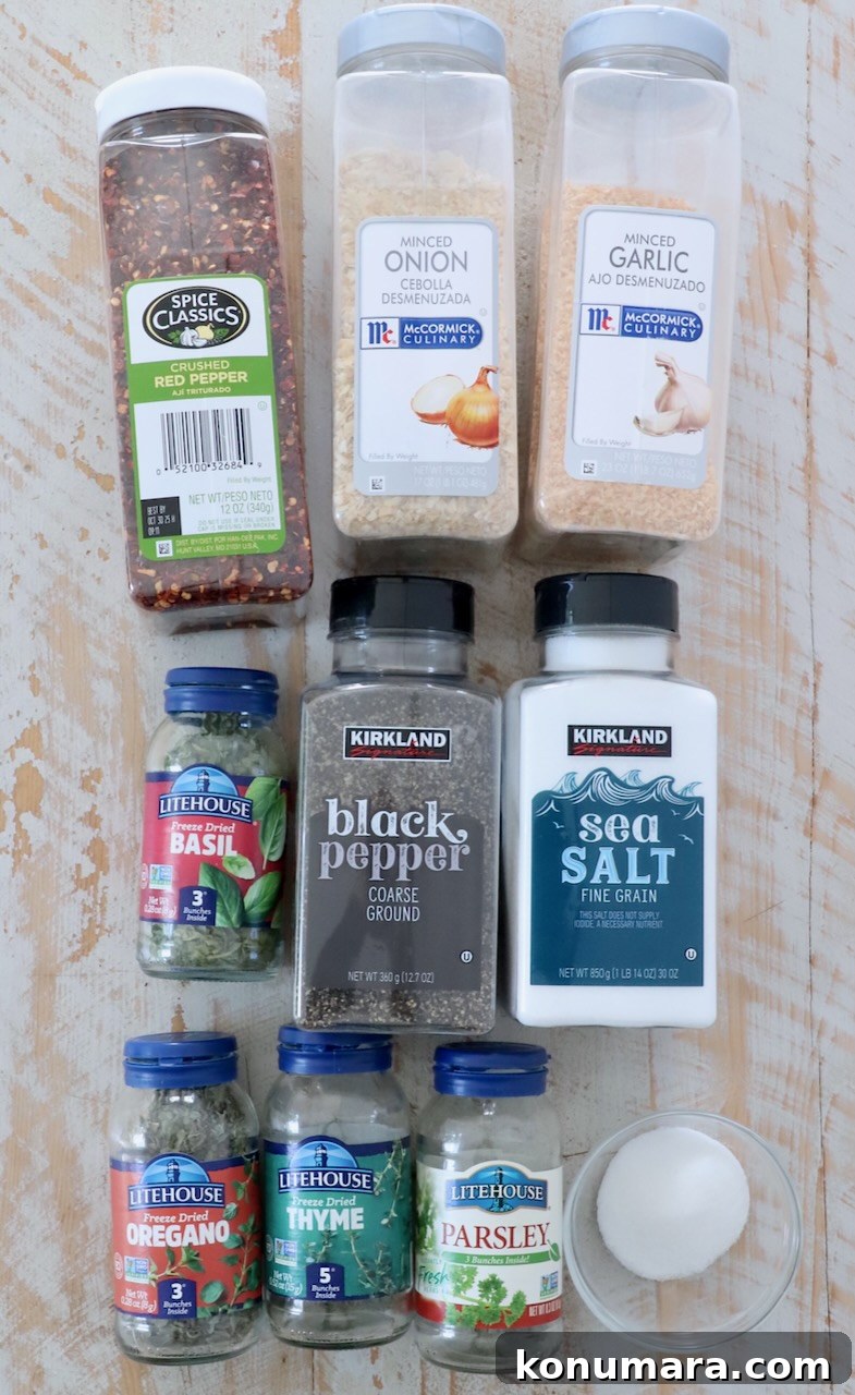 Homemade Italian Dressing Mix Recipe 3 herbs and spices in plastic containers on white wood board