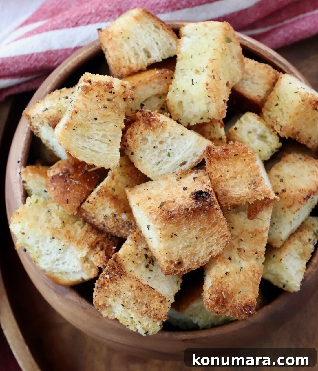 How to Make Crispy Homemade Croutons 7 croutons in wood bowl