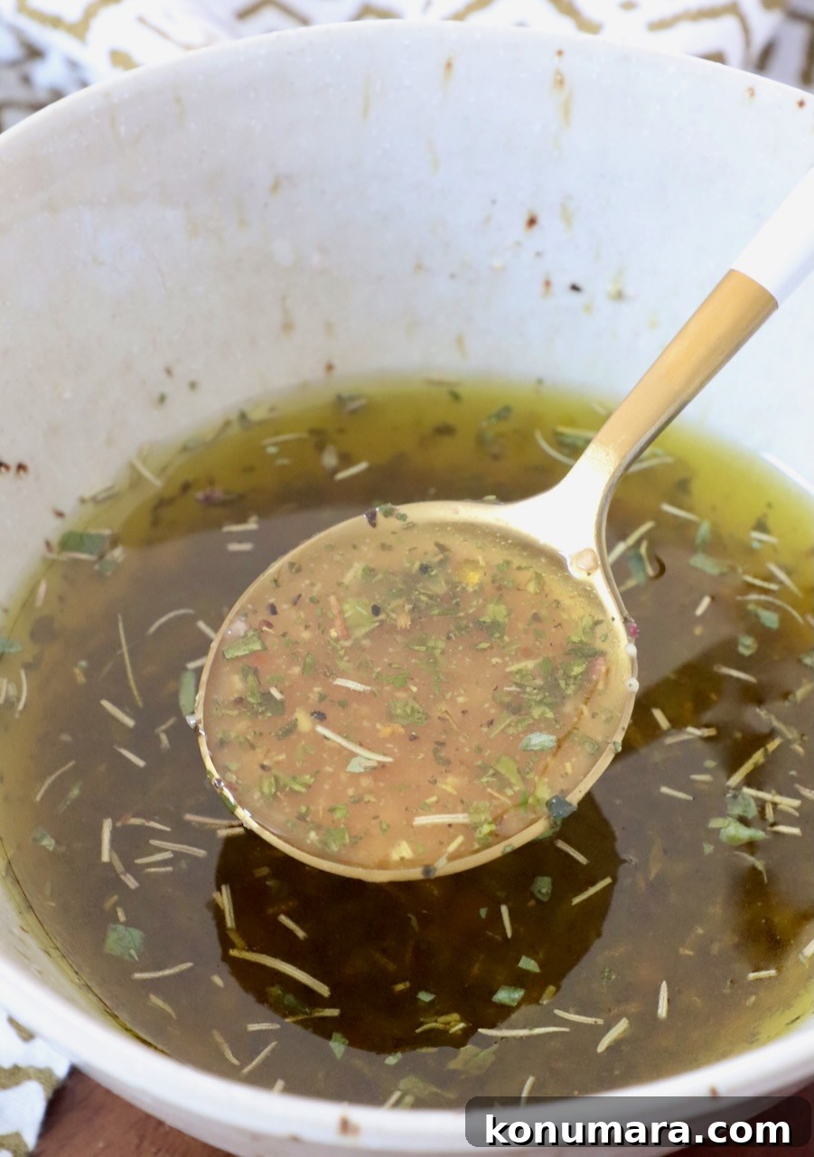 Homemade Zesty Italian Dressing for Salads 2 Italian salad dressing in bowl with spoon