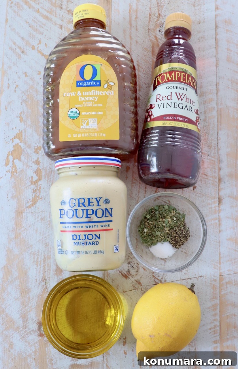 Homemade Zesty Italian Dressing for Salads 3 ingredients for Italian dressing on white wood board