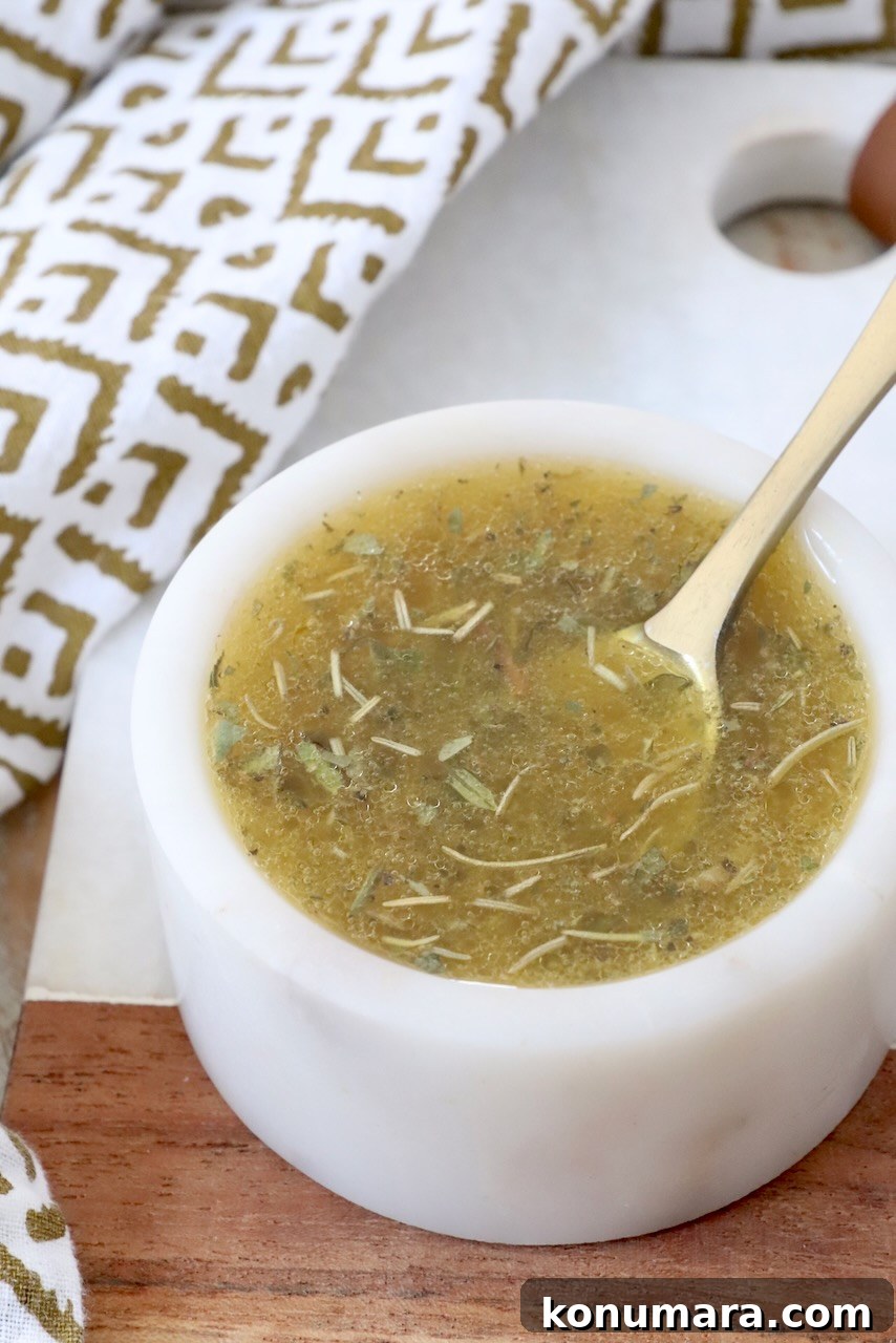 Homemade Zesty Italian Dressing for Salads 7 Italian dressing in small bowl with spoon