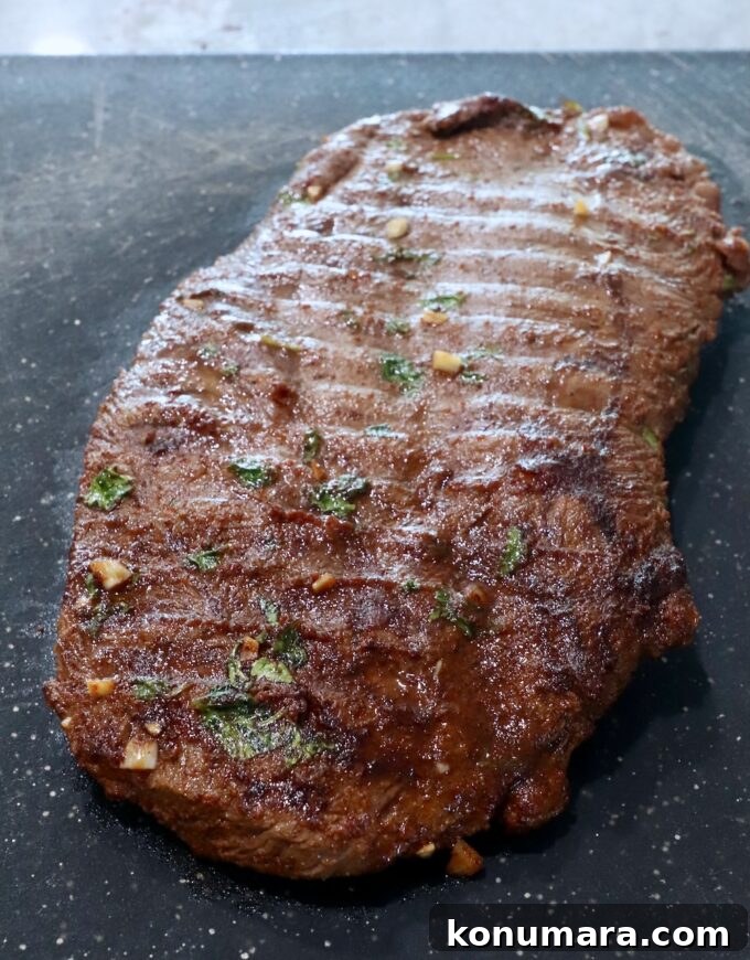 Grilled Flat Iron Steak Tacos with Cilantro Lime Slaw 5 grilled flat iron steak on cutting board