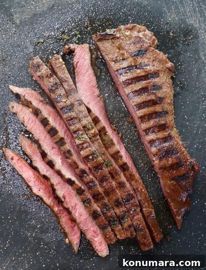 Grilled Flat Iron Steak Tacos with Cilantro Lime Slaw 6 sliced grilled steak on cutting board