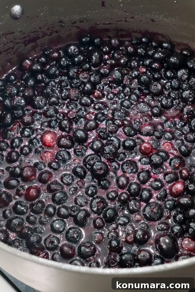 How to Make Homemade Blueberry Pie Filling 6 blueberries in liquid in pan
