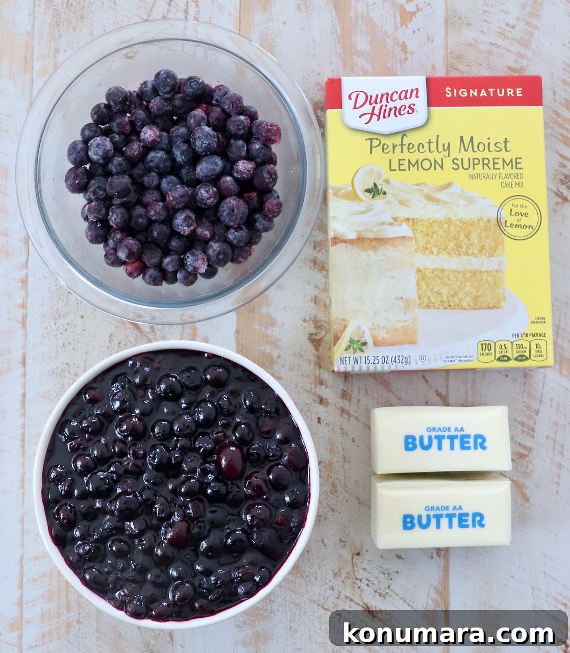 Blueberry Dump Cake Recipe: Irresistible Summer Dessert 3 ingredients in blueberry dump cake on white wood board