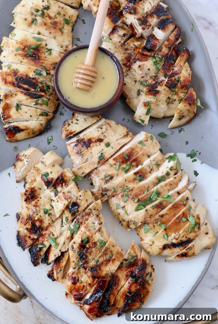 sliced grilled chicken on plate