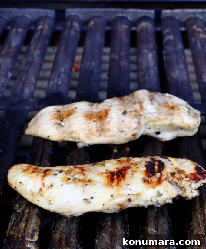 grilled chicken breasts on grill